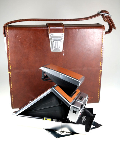 Polaroid con valigetta - sx,