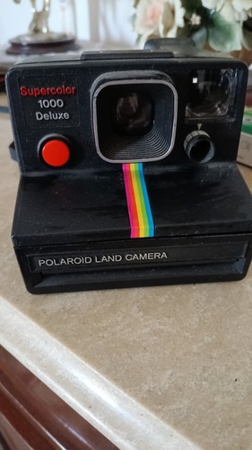 Polaroid land camera - land,